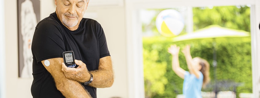 grandfather checking his cgm